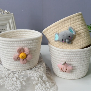 Cute woven cotton rope storage baskets with cartoon bear and flower decorations