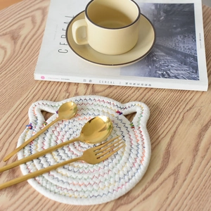 Cat-shaped woven cotton heat insulation mat with stylish golden stainless steel cutlery set