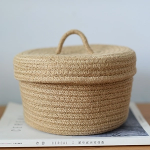 Handwoven cotton and jute storage basket with lid for home organization and snacks