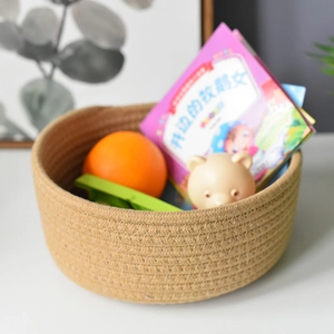 Detailed close-up of woven cotton rope basket storage with durable texture for home organizing