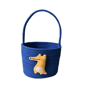 Blue woven gift storage basket with a yellow 3D cartoon crocodile and handle for kids