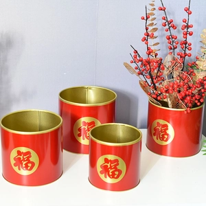 Set of four red metal flower buckets with gold Fu characters for New Year decor