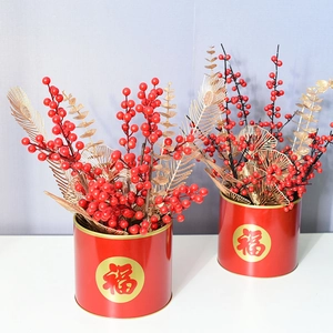 Chinese New Year festive red metal flower buckets with golden berries and Fu character decor