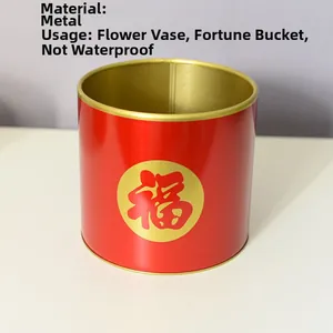 Detail of red festive flower bucket with golden Fu character and metallic interior