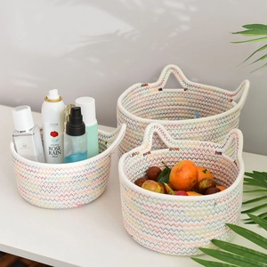 Three-piece set of woven cotton rope baskets with cat ear handles and wave patterns