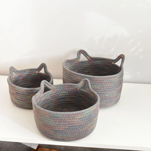 Set of three grey woven cotton storage baskets with cute cat ear handles and stitching