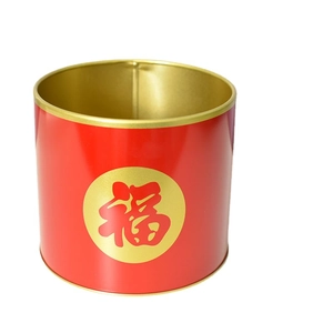 Traditional red metal floral bucket with gold Fu character for festive home decoration