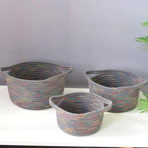 Three-piece gray woven cotton rope storage baskets with wave pattern and handles