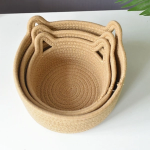 Three-piece nesting woven cotton rope storage baskets with cute cat ear handles