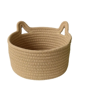 Handwoven cotton rope storage basket with cute cat ears in a warm khaki tone
