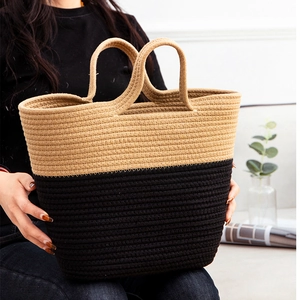 Minimalist two-tone hand-woven straw tote bag for beach vacations and daily use