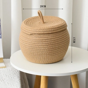 Detail view of cotton rope woven basket with dimensions 20cm diameter and 17cm height