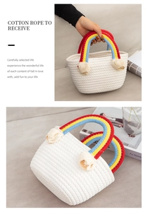 Detail of white cotton rope handwoven bag featuring rainbow handles and tassels