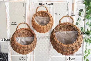 Three-piece set of woven wicker wall hanging baskets with waterproof liners in various sizes