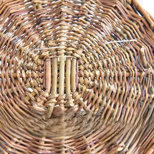 Macro detail of the natural woven willow basket bottom showing texture and craftsmanship