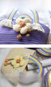 Detail of hand-woven cotton rope tote bags with 3D floral accents and rainbow handles
