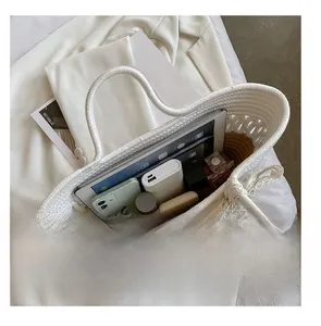 Top view of color-block woven tote bag interior showing spacious capacity for essentials