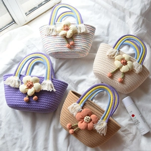 Handwoven cotton rope tote bags with 3D floral accents and rainbow braided handles