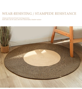 Detail of hand-woven round cotton rug showing spiral texture and durable woven craftsmanship