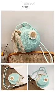 Macro detail of mint green circular straw bag with woven daisy and lace ribbon bow