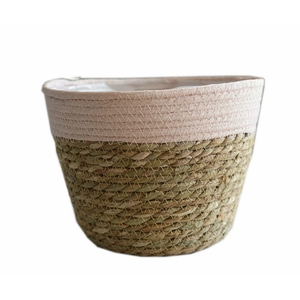 Handmade seagrass planter basket with two-tone weave and decorative zigzag stitching
