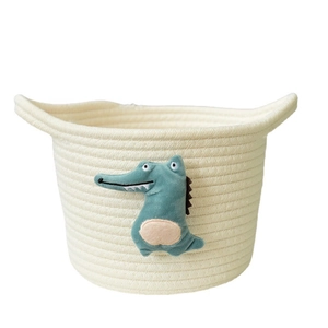 Handwoven cotton rope storage basket with cute blue crocodile for kids room organization
