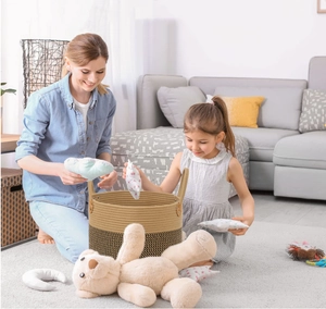 Large woven cotton rope storage basket with leather handles for toys and laundry organization