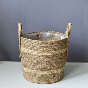 Pastoral woven plant basket with handles and waterproof lining for indoor home decor