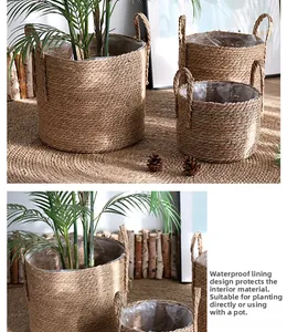 Detail of woven straw plant baskets showing waterproof inner lining and natural fibers