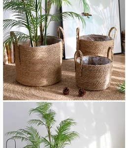 Three-piece woven straw planter set with waterproof liners and dual handles