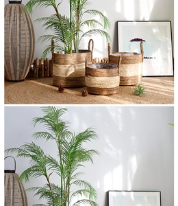 Detail of woven seagrass basket with striped design, dual handles and waterproof plastic liner