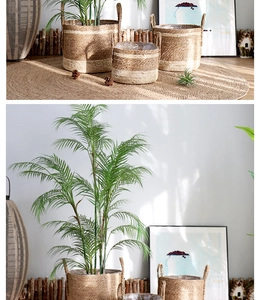 Detail of woven rattan plant pots with waterproof liners and dual handles in three sizes