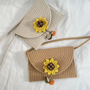 Handmade woven crossbody pumpkin flower beach bag with sunflower detail and tassel