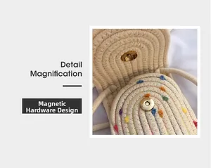 Close-up of metal magnetic snap closure on a woven straw crossbody phone bag