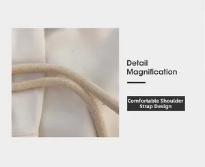 Detail magnification of comfortable cotton rope shoulder strap on mini straw canvas bag
