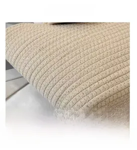 Macro shot of cotton rope woven texture showing detailed craftsmanship of summer tote bag