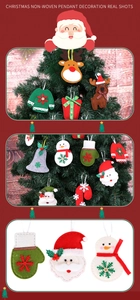 Detailed view of assorted Christmas felt ornaments with handmade stitching and wood buttons