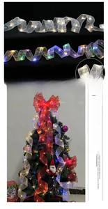 Detail of 5cm double-layer LED ribbon string lights with festive red bow decoration