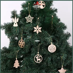 Detail of wooden Christmas tree ornaments with laser-cut stars, reindeer, and snowflakes