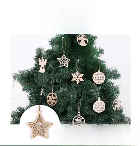Detailed view of hollowed-out wooden Christmas tree ornaments with reindeer and star patterns