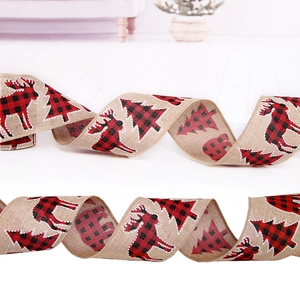 Detail of 6m burlap Christmas ribbon with reindeer and buffalo plaid tree patterns