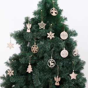 Christmas wooden hanging ornaments set with laser-cut star and reindeer on tree branch
