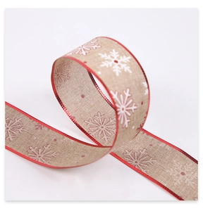 Close-up of 2m Christmas ribbon with snowflake patterns for DIY wreaths and gift wrapping