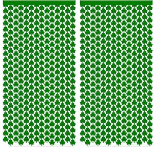 Detailed close-up of green shamrock foil fringe curtains for St. Patrick's Day party decor