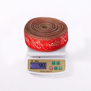 Weight measurement of 6.3cm red and gold Merry Christmas printed decorative ribbon