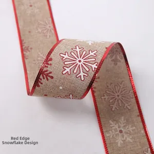 Close-up of Christmas linen ribbon featuring red snowflake patterns and metallic edges