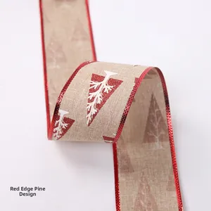 Detail of red-edged Christmas linen ribbon with pine tree print and glitter border