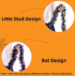 Detail of Halloween tinsel garlands with silver skull and purple bat themed decorations