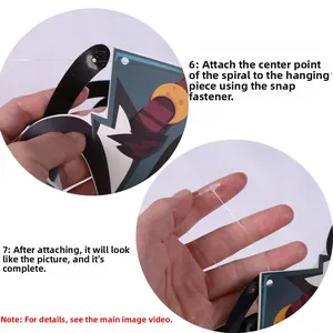 Close-up detail showing the snap hook assembly for Halloween swirl decorations