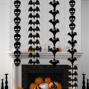 Close-up of Halloween felt garland featuring black skull, bat and ghost silhouettes